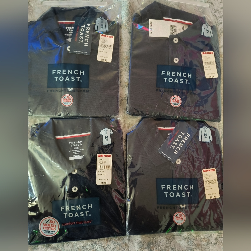 Navy blue uniform shirts size M(8) . 3 long sleeve and one short for boy & girl